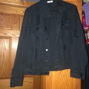 Ripped black denim jacket